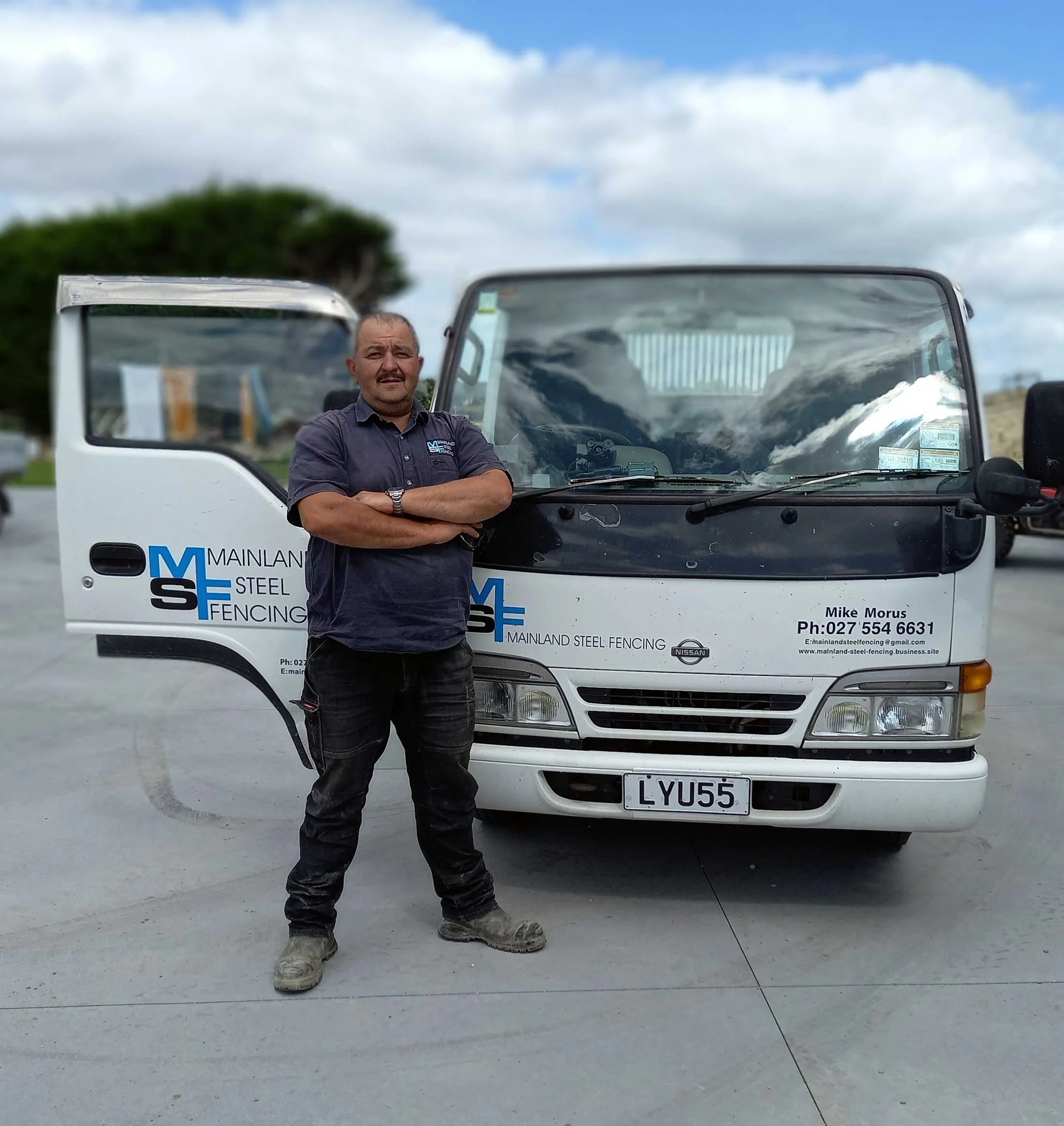 Mike Morus standing in front of the Mainland Steel Fencing truck